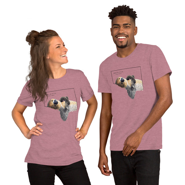 Product mockup with a male and a female model wearing the heather orchid coloured shirt.