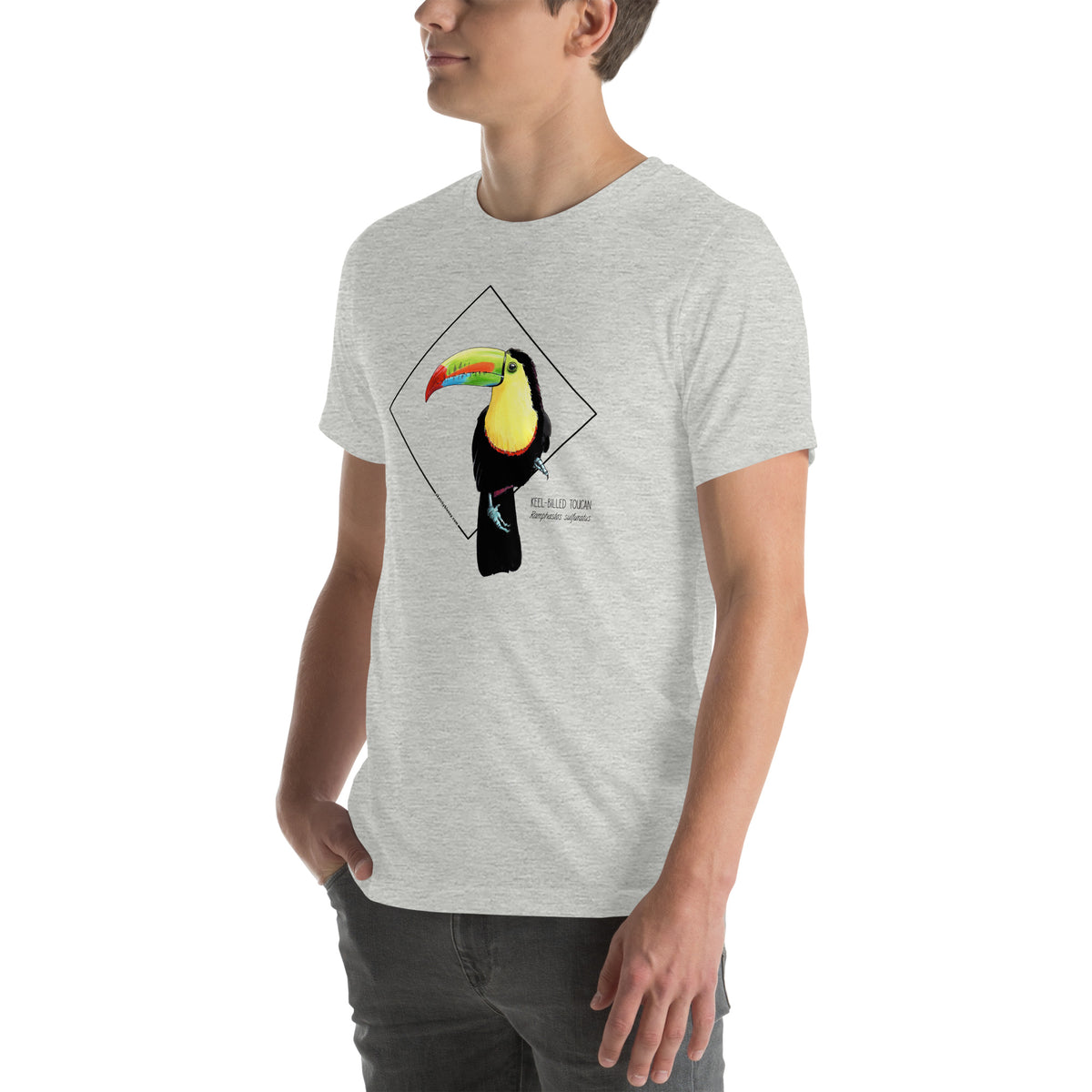 Product mockup showing a male model wearing the keel-billed toucan shirt in the colour athletic heather.