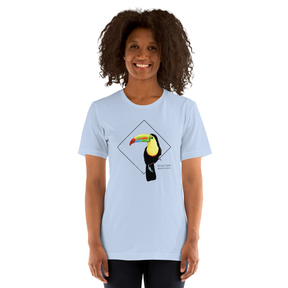 Product mockup showing a female model wearing the keel-billed toucan shirt in the colour steel blue.