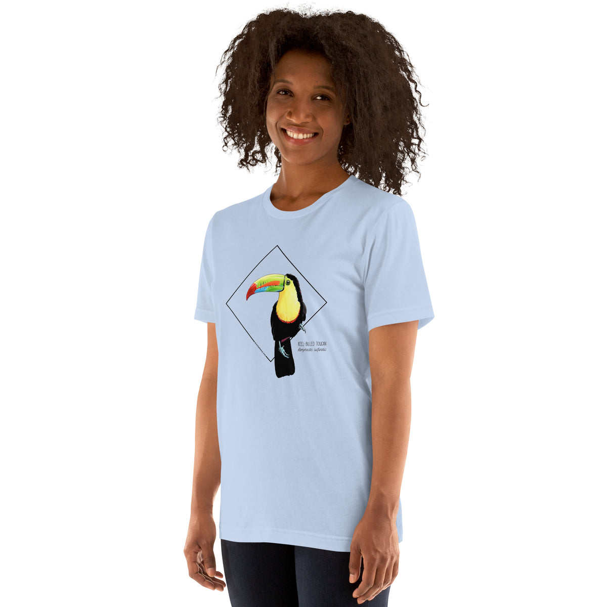 Product mockup showing a female model wearing the keel-billed toucan shirt in the colour steel blue.