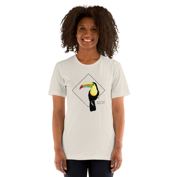 Product mockup showing a female model wearing the keel-billed toucan shirt in the colour heather dust.