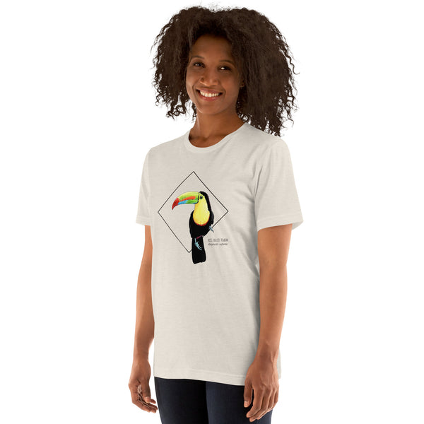 Product mockup showing a female model wearing the keel-billed toucan shirt in the colour heather dust.