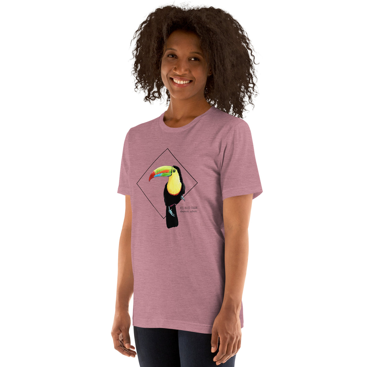 Product mockup showing a female model wearing the keel-billed toucan shirt in the colour heather orchid.