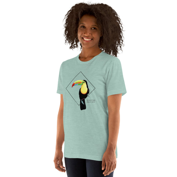 Product mockup showing a female model wearing the keel-billed toucan shirt in the colour heather prism dusty blue.