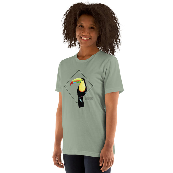 Product mockup showing a female model wearing the keel-billed toucan shirt in the colour sage.
