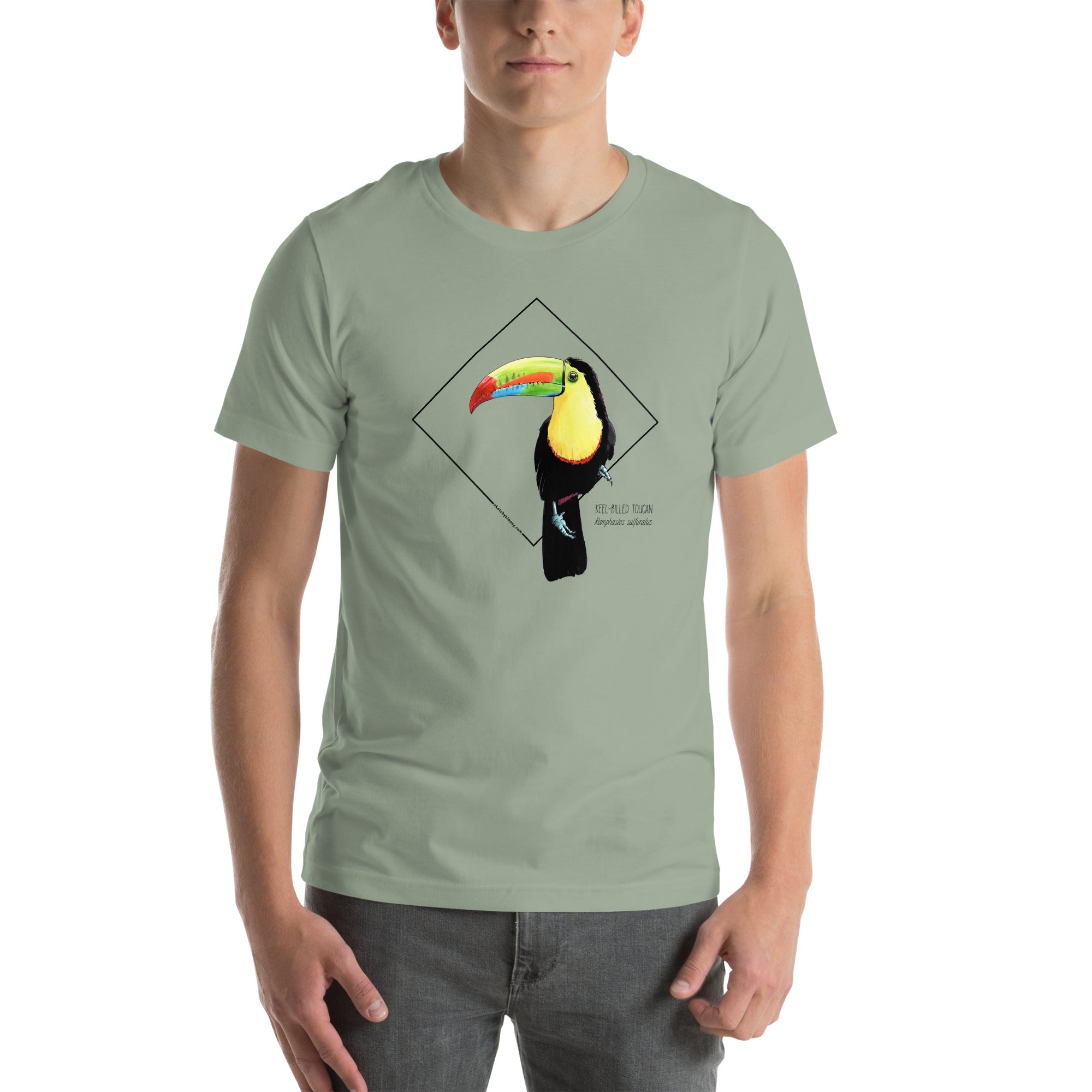 Product mockup showing a male model wearing the keel-billed toucan shirt in the colour sage.