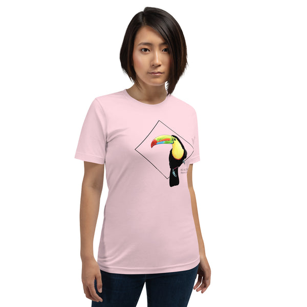 Product mockup showing a female model wearing the keel-billed toucan shirt in the colour soft pink.