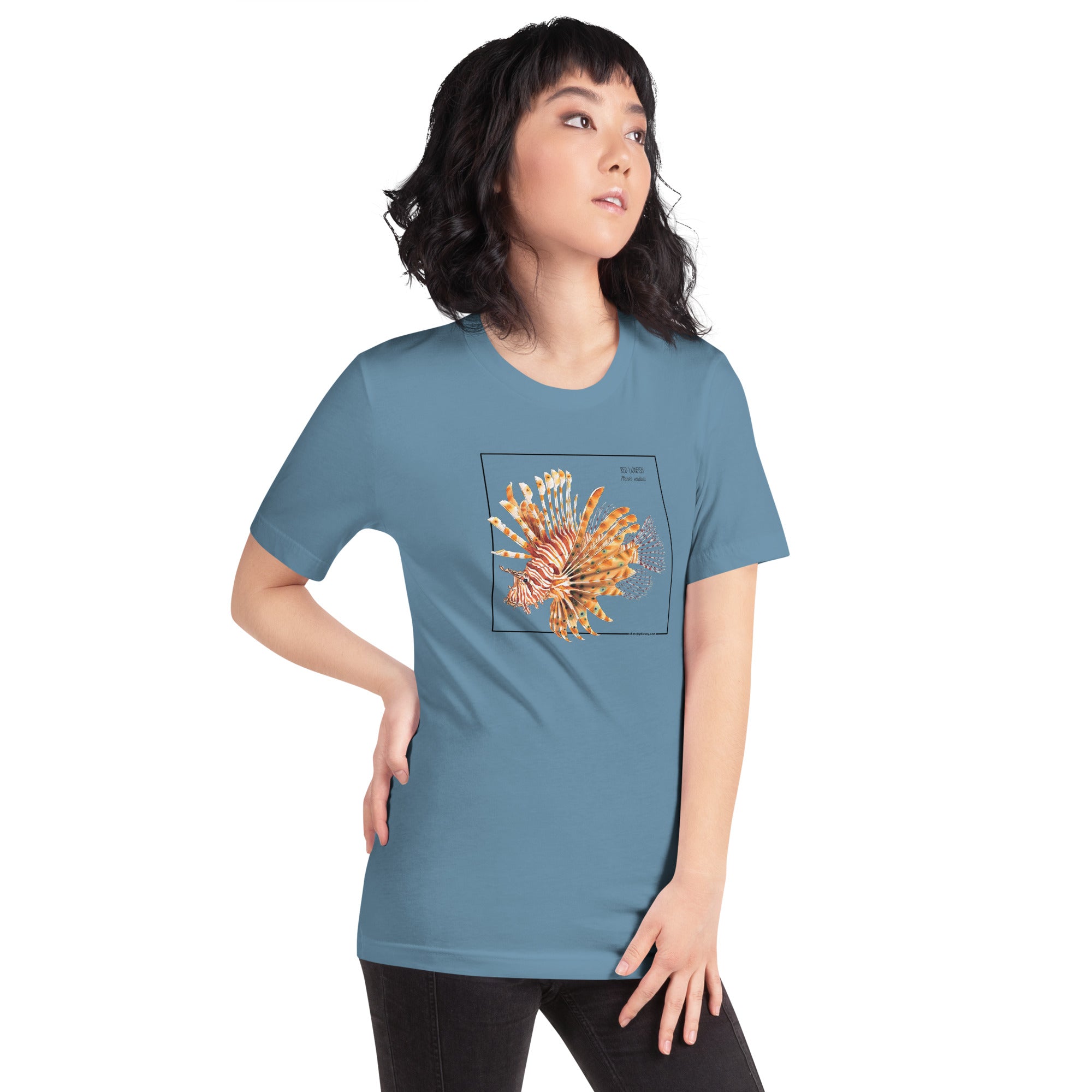 Product mockup with a female model wearing the red lionfish t-shirt in the colour steel blue.